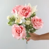 The wedding is decorated with a center of 9 pieces of artificial and simple flowers details Picture
